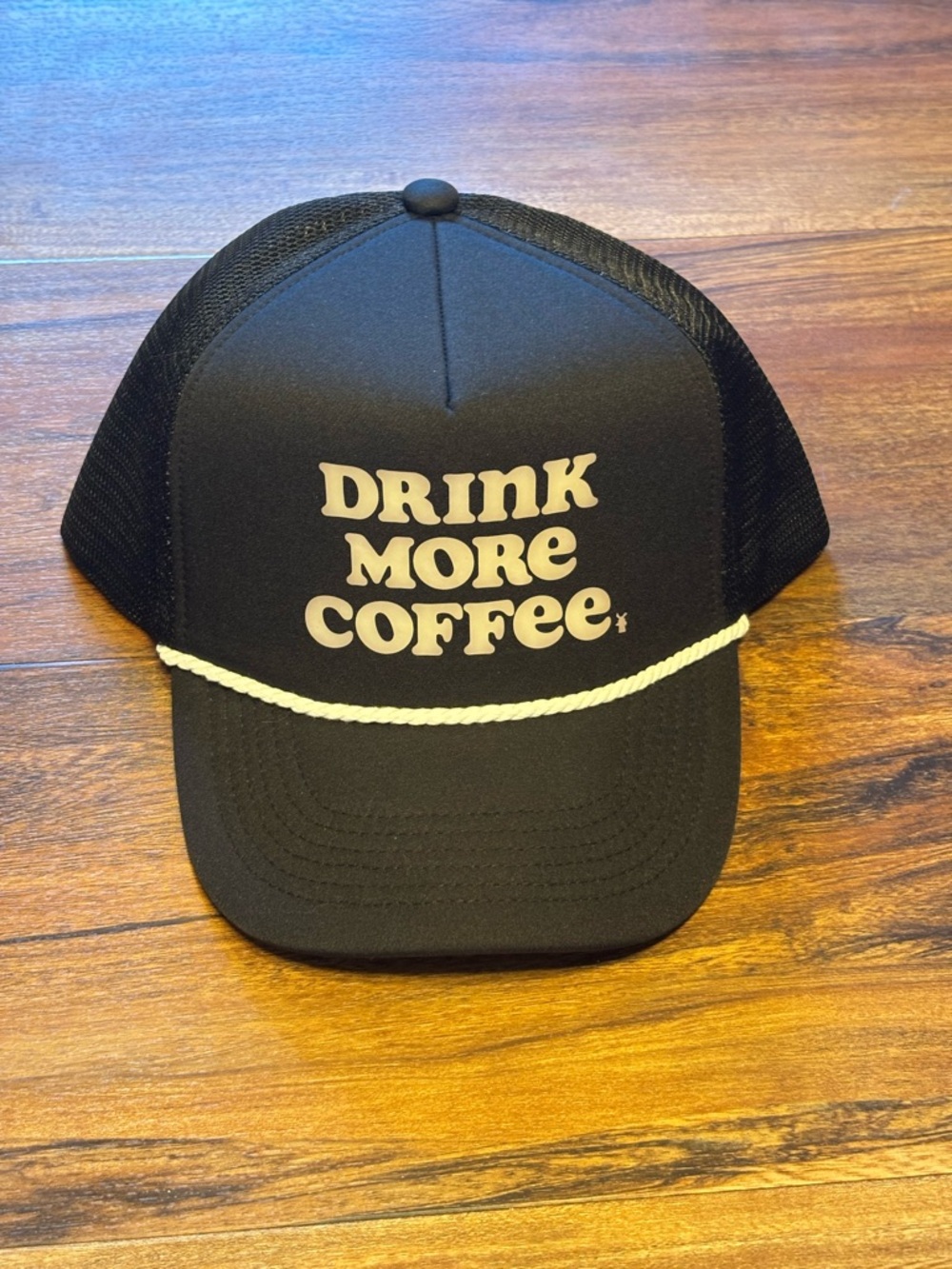 New Dutch bros Black Trucker Hat with "DRINK MORE COFFEE" Rope Detail